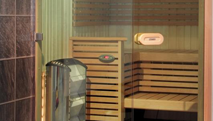 Special sauna (tailor made) with double door set-up inside an exclusive Hotel