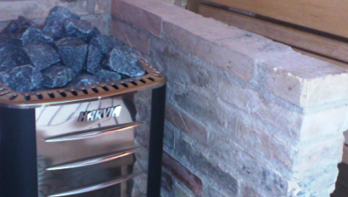 Rivestimento locale sauna con stufa a legna, Realizzazioni: le nostre migliori success stories di installazione saune ed accessori, Bozzolo - Mantova